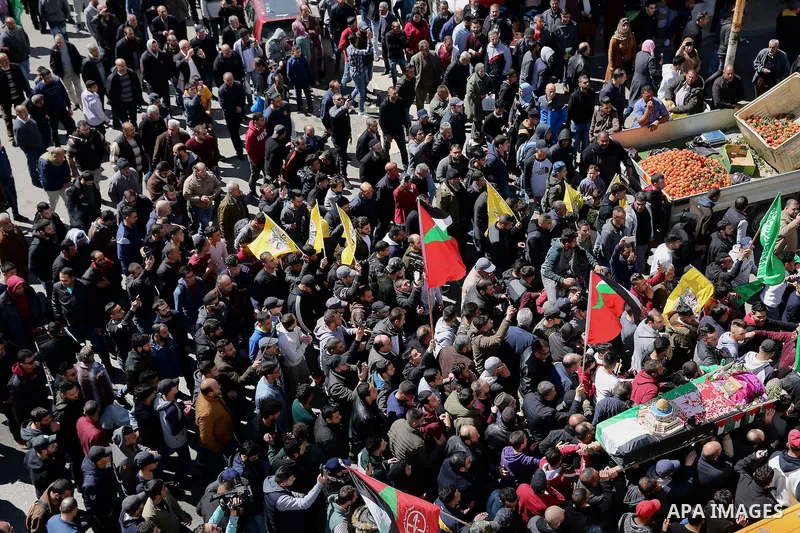 Mourners carry the body of Palestinian Samah Mubarak, 16, during her funeral in the West Bank city of Ramallah, on March 9, 2019, after the Israeli army handed over the corpse of the girl. Israeli officers shot dead Muba...