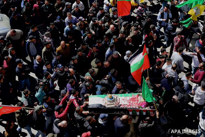 Mourners carry the body of Palestinian Samah Mubarak, 16, during her funeral in the West Bank city of Ramallah, on March 9, 2019, after the Israeli army handed over the corpse of the girl. Israeli officers shot dead Muba...