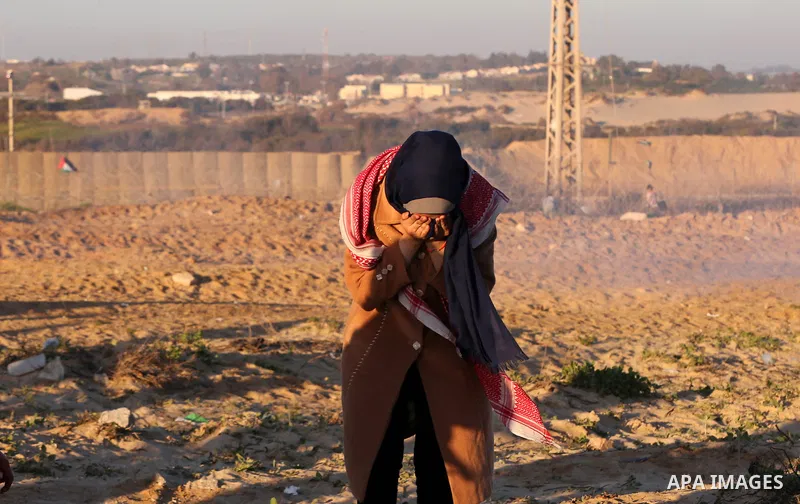 Palestinian demonstrators take part in a protest on the beach along the northern Gaza border, across from the Israeli settlement of Kibbutz Zikim, on March19, 2019, as part of weekly maritime protests against the naval b...