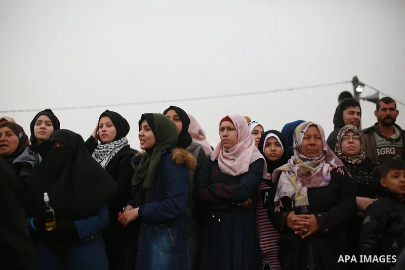 Palestinian protesters gather during a demonstration demand the right to return to their homeland at the Israel-Gaza border in the east of Gaza city on March 30, 2019. Two Palestinians killed and many injuries among thou...