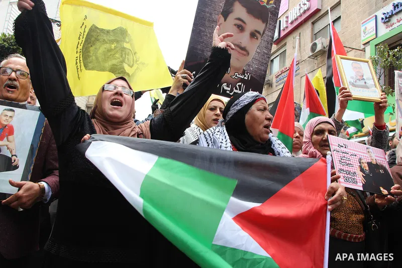 Palestinians take part in a protest to show solidarity with prisoners in Israeli jails, and marking Palestinian Prisoners' Day, in the West Bank city of Ramallah on April 17, 2019. Palestinians are marking Prisoners' Day...