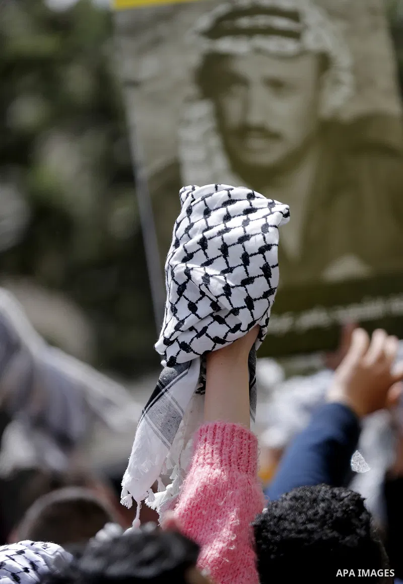 Palestinian supporters of the Fatah movement celebrate the results of the student council Birzeit University election, in the West Bank city of Ramallah, on April 18, 2019. A total of 9041 out of 11,830 eligible student...