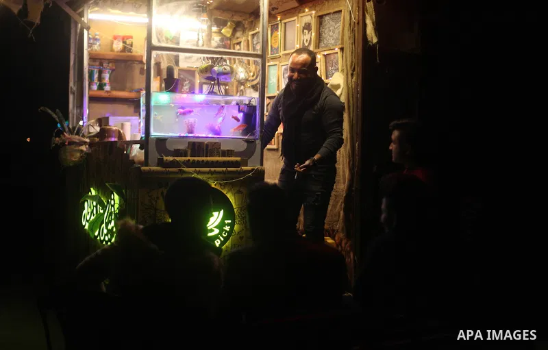 Samer al-Zuhdi, a 27 year-old Palestinian man, works in a street cafe, at the beach of Gaza city, on April 21, 2019. Al-Zuhdi works at his own street cafe named Mövenpick " a world-class Hotels & Resorts management compa...