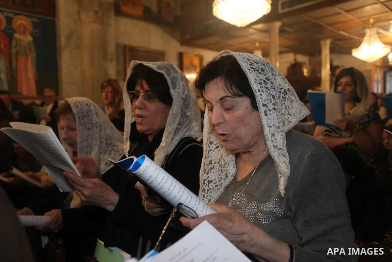 Palestinian Orthodox Christians gather at the Church of Saint Porphyrius as they celebrated the Good Friday procession, in Gaza city on April 26, 2019. Photo by Mahmoud Ajjour