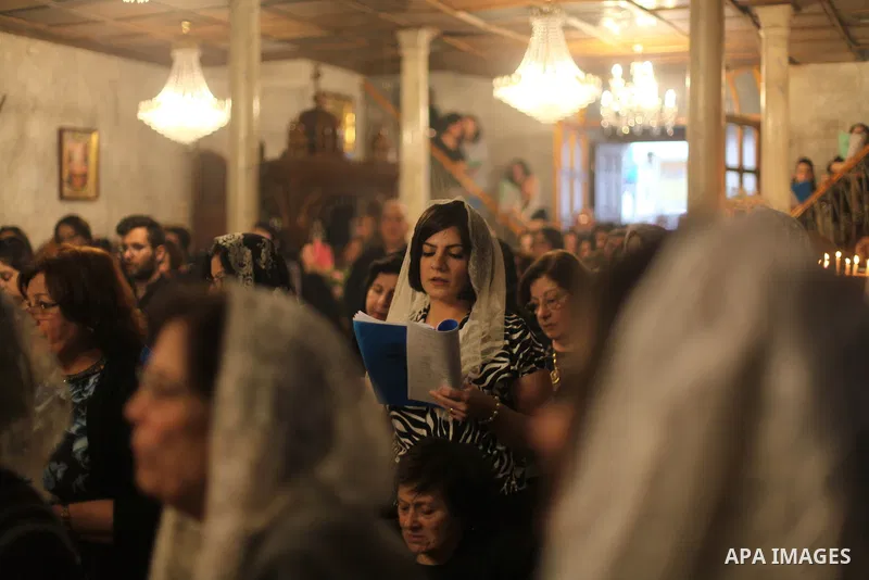 Palestinian Orthodox Christians gather at the Church of Saint Porphyrius as they celebrated the Good Friday procession, in Gaza city on April 26, 2019. Photo by Mahmoud Ajjour
