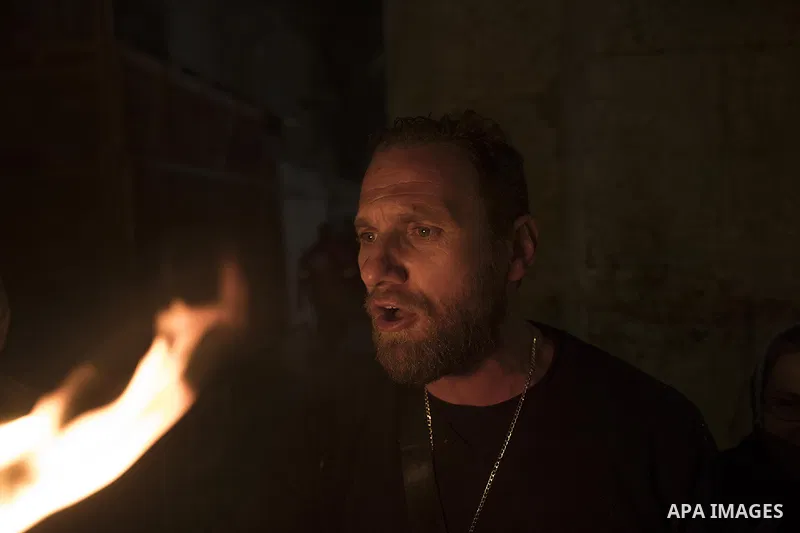 Orthodox Christian worshippers attend the Holy Fire ceremony in the Church of the Holy Sepulchre in Jerusalem's Old City, on April 27, 2019. Eastern Faithful believe that the Holy Fire, which emanates from within the Tom...