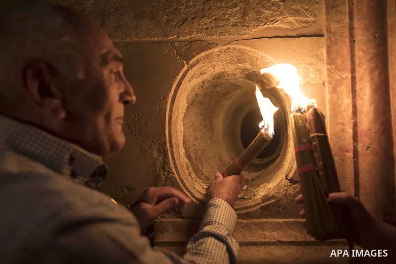 Orthodox Christian worshippers attend the Holy Fire ceremony in the Church of the Holy Sepulchre in Jerusalem's Old City, on April 27, 2019. Eastern Faithful believe that the Holy Fire, which emanates from within the Tom...