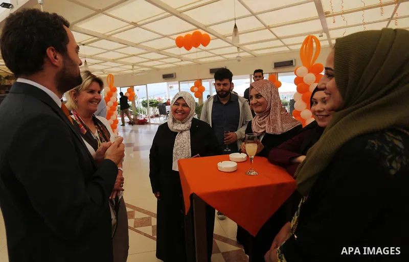 Palestinian and foreign activists take part in the celebration of Netherlands King's Day, in Gaza city on April 30, 2019. The King's Day is a national holiday in the Netherlands, marking the birth of King Willem-Alexande...