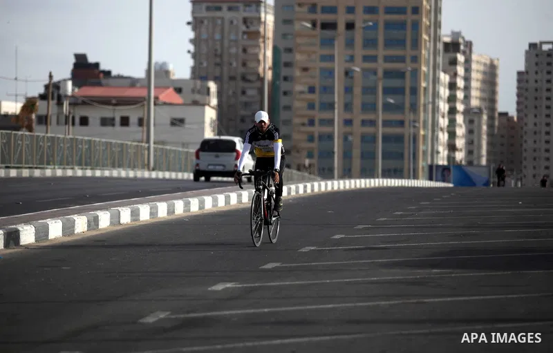 Palestinian cyclist girls ride bicycles during a sport cycling training, organized by the Palestinian Triathlon Federation in Gaza city, on May 26, 2019. Photo by Mahmoud Ajjour