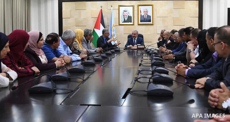 Palestinian Prime Minister Mohammad Ishtayeh meets with figures fron Tulkarm Governorate, at his headquarter in the West Bank city of Ramallah on May 29, 2019. Photo by Prime Minister Office