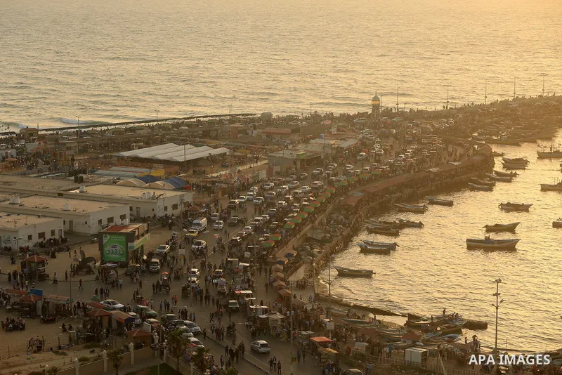 Boats are seen at the Gaza seaport as Palestinians enjoy the holiday of Eid al-Fitr festival, which marks the end of the Muslim holy month of Ramadan in Gaza, on June 7, 2019. Photo by Atia Darwish