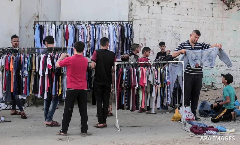 A picture taken on May 30, 2019, shows Palestinian vendors display second hand goods at a public market in Gaza city. Due to the current economic situation in Gaza Strip, many of the Palestinians resort to meet their nee...