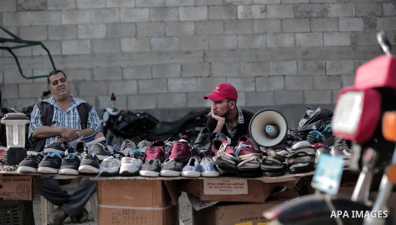 A picture taken on May 30, 2019, shows Palestinian vendors display second hand goods at a public market in Gaza city. Due to the current economic situation in Gaza Strip, many of the Palestinians resort to meet their nee...