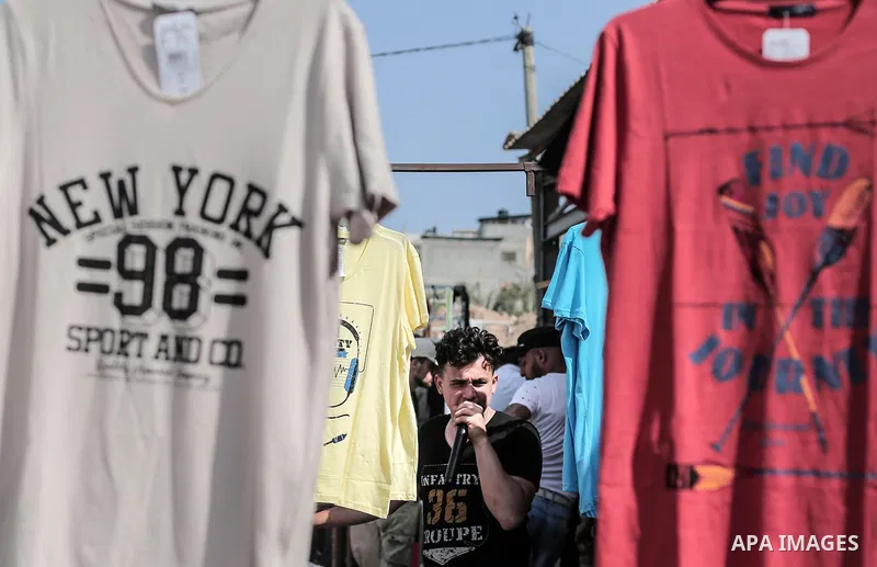 A picture taken on May 30, 2019, shows Palestinian vendors display second hand goods at a public market in Gaza city. Due to the current economic situation in Gaza Strip, many of the Palestinians resort to meet their nee...