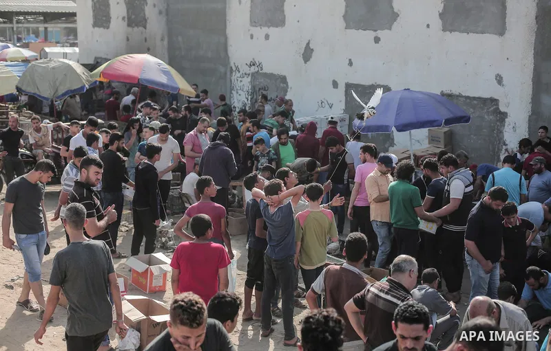 A picture taken on May 30, 2019, shows Palestinian vendors display second hand goods at a public market in Gaza city. Due to the current economic situation in Gaza Strip, many of the Palestinians resort to meet their nee...