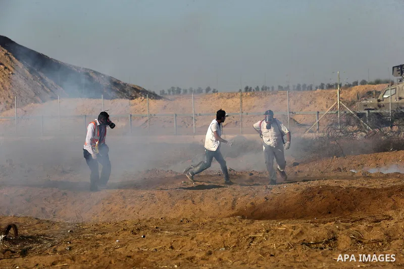 Palestinian protesters clash with Israeli troops following the tents protest where Palestinians demand the right to return to their homeland at the Israel-Gaza border, in Khan Younis in the southern Gaza Strip, July 05,...