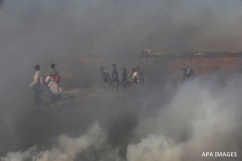 Palestinian protesters clash with Israeli troops following the tents protest where Palestinians demand the right to return to their homeland at the Israel-Gaza border, in Khan Younis in the southern Gaza Strip, July 05,...