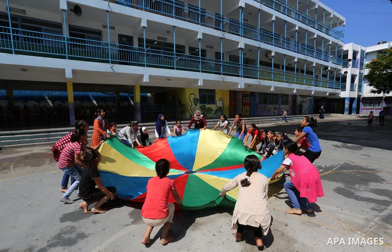 Palestinian girls play at a summer camp run by the United Nations Relief and Works Agency (UNRWA) in Gaza City on July 08, 2019. the UNRWA Summer Games programme provides the children of Gaza with a rare opportunity to m...