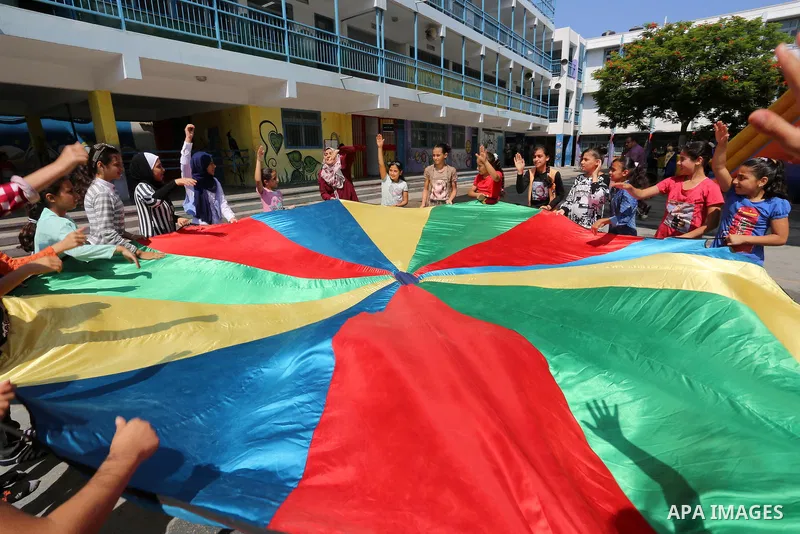 Palestinian girls play at a summer camp run by the United Nations Relief and Works Agency (UNRWA) in Gaza City on July 08, 2019. the UNRWA Summer Games programme provides the children of Gaza with a rare opportunity to m...