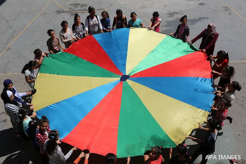 Palestinian girls play at a summer camp run by the United Nations Relief and Works Agency (UNRWA) in Gaza City on July 08, 2019. the UNRWA Summer Games programme provides the children of Gaza with a rare opportunity to m...