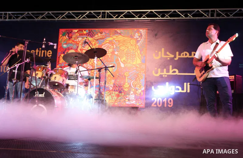 Palestinian artists perform during Palestine International Festival 2019, in Gaza City, on July 9, 2019. Photo by Mahmoud Ajjour
