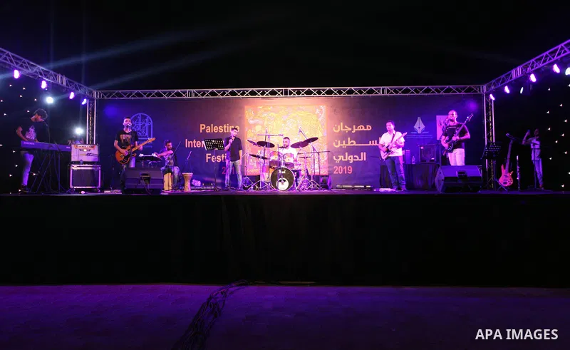 Palestinian artists perform during Palestine International Festival 2019, in Gaza City, on July 9, 2019. Photo by Mahmoud Ajjour