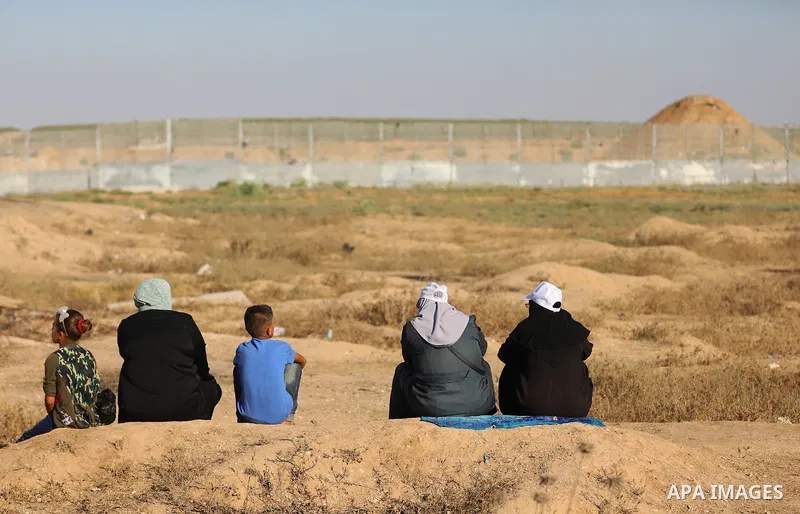 Palestinian protesters clash with Israeli troops following the tents protest where Palestinians demand the right to return to their homeland at the Israel-Gaza border, in the east of Gaza city, July 19, 2019. Photo by Ma...