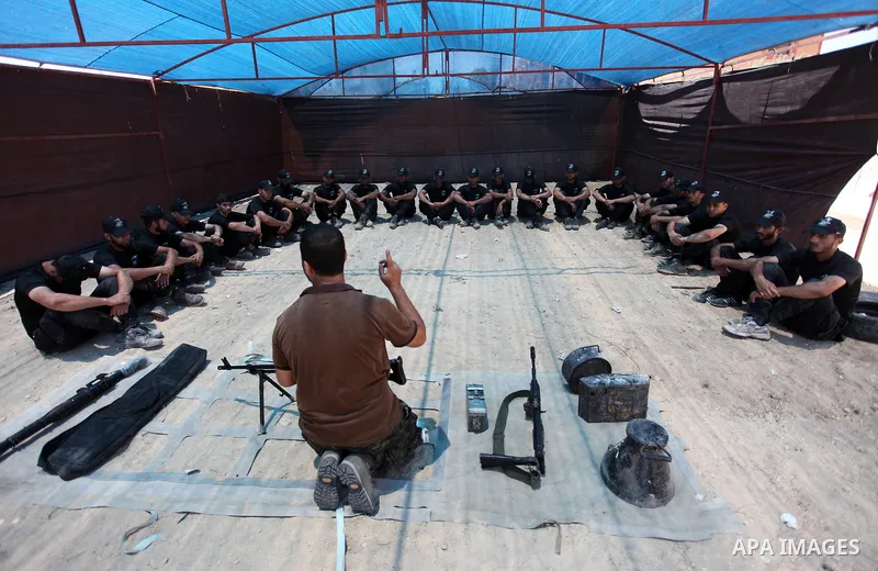 Palestinian youths take part in a military-style exercise a Hamas-run summer camp at the Yarmouk military site, in Gaza city, on July 20, 2019. Photo by Mahmoud Ajjour