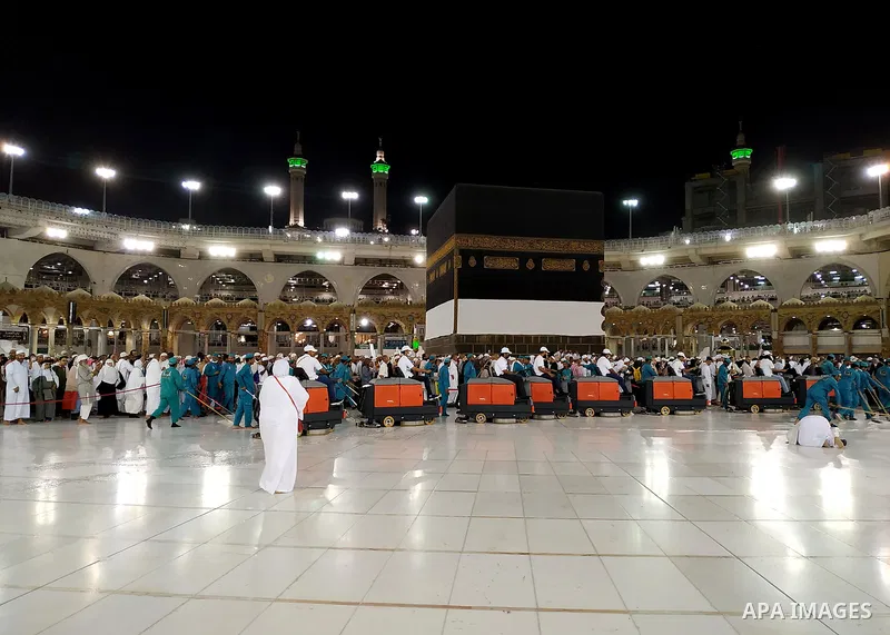 Workers clean the floor of the holy Kaaba at the Grand Mosque, during the annual hajj pilgrimage in Mecca July 31, 2019. According to the Muslims holy book the Koran, the Kaaba was built by Abraham and his son Ismael, af...