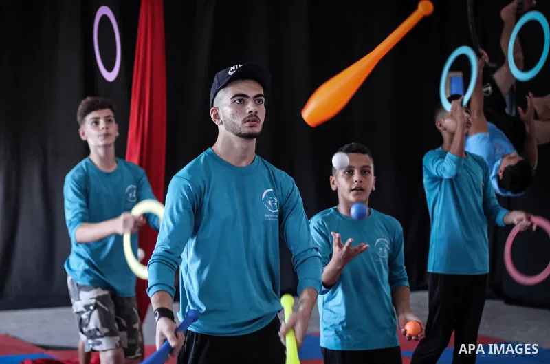 Members of Gaza stars circus perform during a training sesson in Gaza city, July 31, 2019. The Gaza Circus School which was founded two years ago and survives on donations. Photo by Mahmoud Ajjour