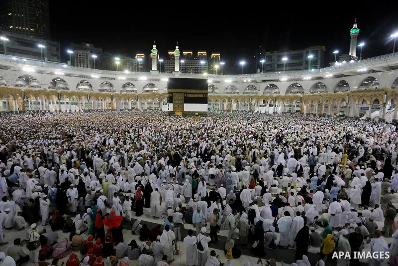 Muslim Pilgrims gather around the Kaaba, Islam's holiest shrine, during the annual hajj pilgrimage at the Grand Mosque in the Saudi city of Mecca, August 01, 2019. Photo by Ashraf Amra