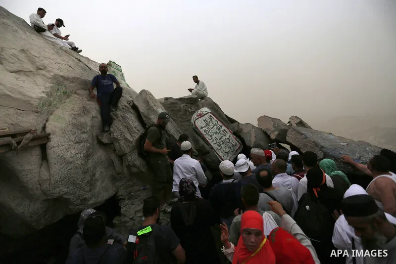 Muslim pilgrims pray at Mount Al-Noor during the annual haj pilgrimage in Mecca, on August 6, 2019. Mount Al-Noor houses Ghar-E-Hira or Hira cave, where Prophet Mohammad is said to have spent a great deal of time in the...