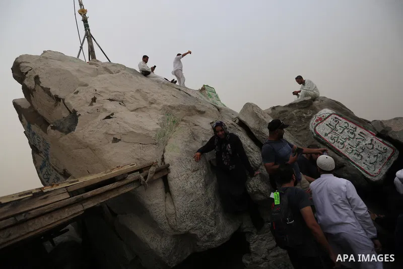 Muslim pilgrims pray at Mount Al-Noor during the annual haj pilgrimage in Mecca, on August 6, 2019. Mount Al-Noor houses Ghar-E-Hira or Hira cave, where Prophet Mohammad is said to have spent a great deal of time in the...