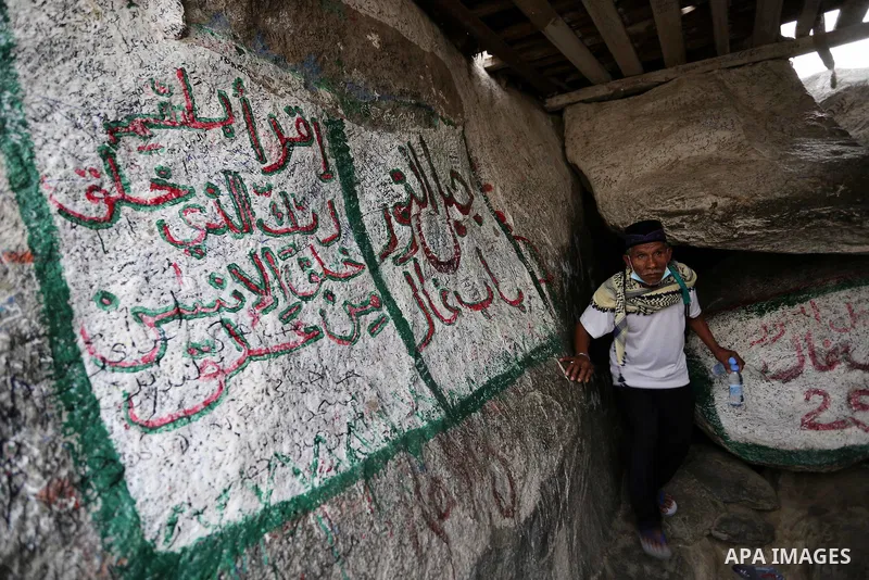 A Muslim pilgrim prays at Mount Al-Noor during the annual haj pilgrimage in Mecca, on August 6, 2019. Mount Al-Noor houses Ghar-E-Hira or Hira cave, where Prophet Mohammad is said to have spent a great deal of time in th...