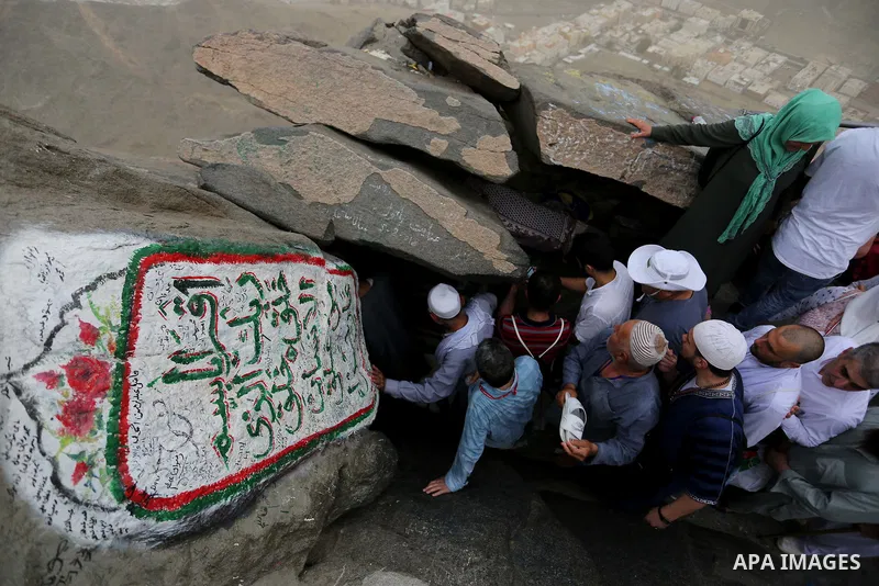 Muslim pilgrims pray at Mount Al-Noor during the annual haj pilgrimage in Mecca, on August 6, 2019. Mount Al-Noor houses Ghar-E-Hira or Hira cave, where Prophet Mohammad is said to have spent a great deal of time in the...