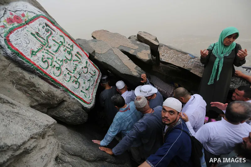 Muslim pilgrims pray at Mount Al-Noor during the annual haj pilgrimage in Mecca, on August 6, 2019. Mount Al-Noor houses Ghar-E-Hira or Hira cave, where Prophet Mohammad is said to have spent a great deal of time in the...