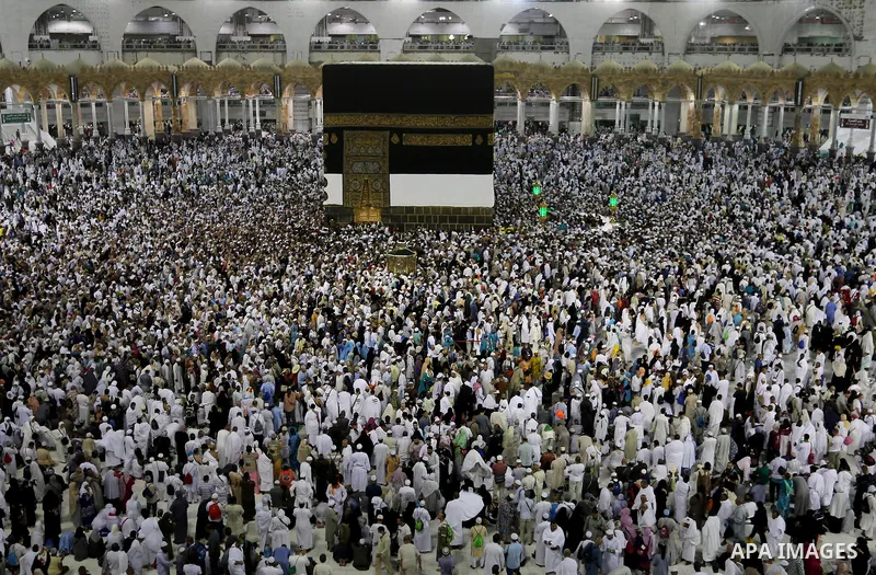 A Muslim pilgrim prays at Mount Al-Noor during the annual haj pilgrimage in Mecca, on August 6, 2019. Mount Al-Noor houses Ghar-E-Hira or Hira cave, where Prophet Mohammad is said to have spent a great deal of time in th...