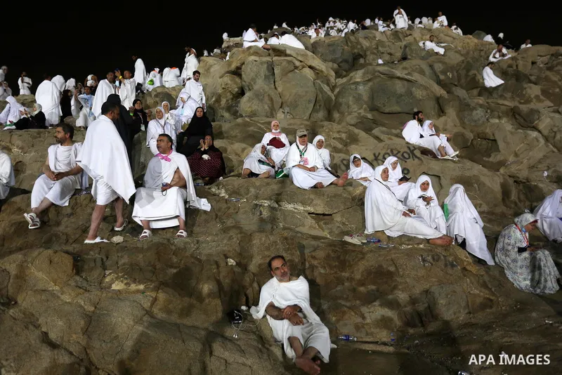 Muslim pilgrims pray on Mount Arafat, as Jabal al-Rahma near Mecca, as they take part in one of the Hajj rituals southeast of the Saudi holy city of Mecca on August 10, 2019. Arafat is the site where Muslims believe the...
