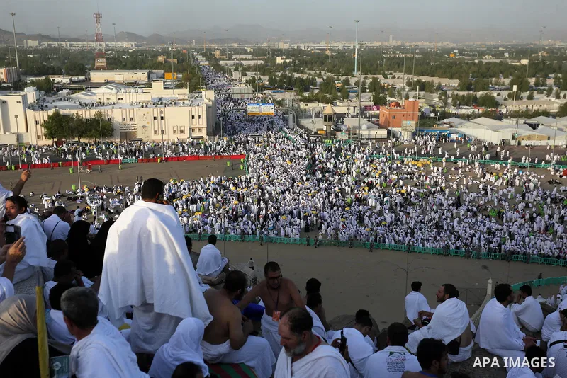 Muslim pilgrims pray on Mount Arafat, as Jabal al-Rahma near Mecca, as they take part in one of the Hajj rituals southeast of the Saudi holy city of Mecca on August 10, 2019. Arafat is the site where Muslims believe the...