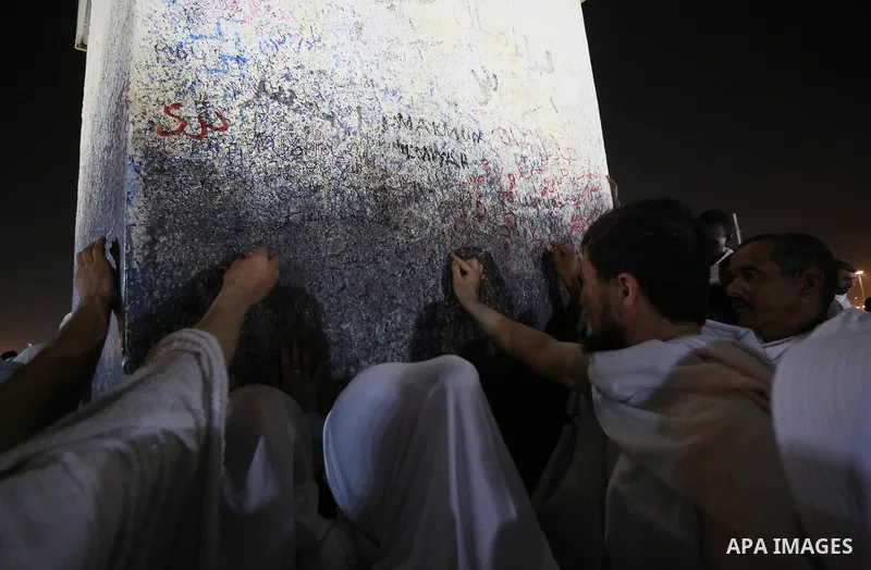 Muslim pilgrims pray on Mount Arafat, as Jabal al-Rahma near Mecca, as they take part in one of the Hajj rituals southeast of the Saudi holy city of Mecca on August 10, 2019. Arafat is the site where Muslims believe the...