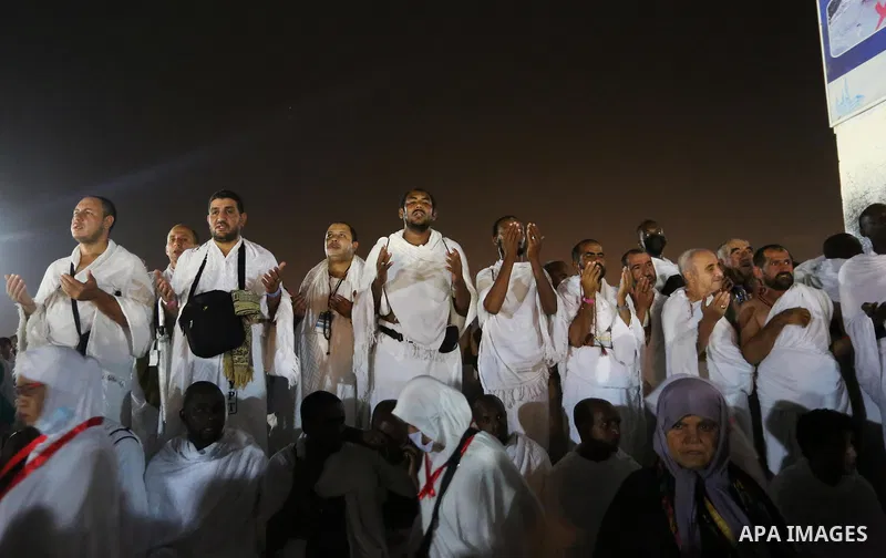 Muslim pilgrims pray on Mount Arafat, as Jabal al-Rahma near Mecca, as they take part in one of the Hajj rituals southeast of the Saudi holy city of Mecca on August 10, 2019. Arafat is the site where Muslims believe the...