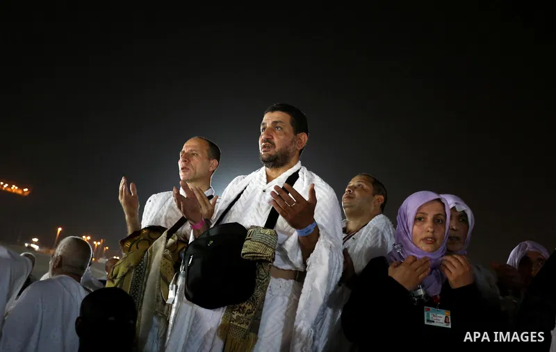 Muslim pilgrims pray on Mount Arafat, as Jabal al-Rahma near Mecca, as they take part in one of the Hajj rituals southeast of the Saudi holy city of Mecca on August 10, 2019. Arafat is the site where Muslims believe the...