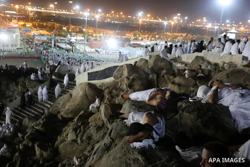 Muslim pilgrims pray on Mount Arafat, as Jabal al-Rahma near Mecca, as they take part in one of the Hajj rituals southeast of the Saudi holy city of Mecca on August 10, 2019. Arafat is the site where Muslims believe the...