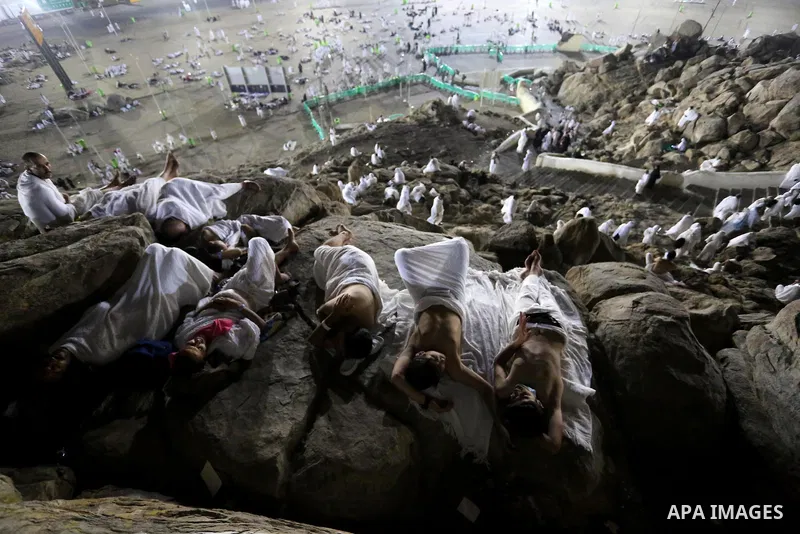 Muslim pilgrims pray on Mount Arafat, as Jabal al-Rahma near Mecca, as they take part in one of the Hajj rituals southeast of the Saudi holy city of Mecca on August 10, 2019. Arafat is the site where Muslims believe the...