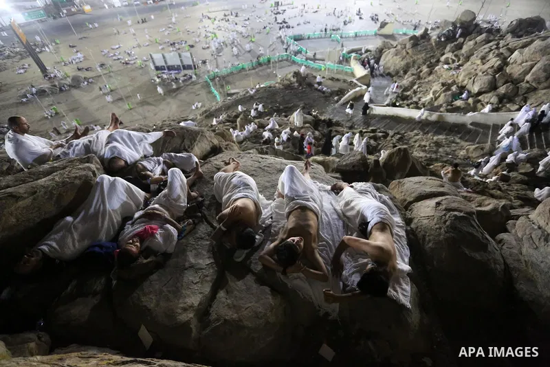 Muslim pilgrims pray on Mount Arafat, as Jabal al-Rahma near Mecca, as they take part in one of the Hajj rituals southeast of the Saudi holy city of Mecca on August 10, 2019. Arafat is the site where Muslims believe the...