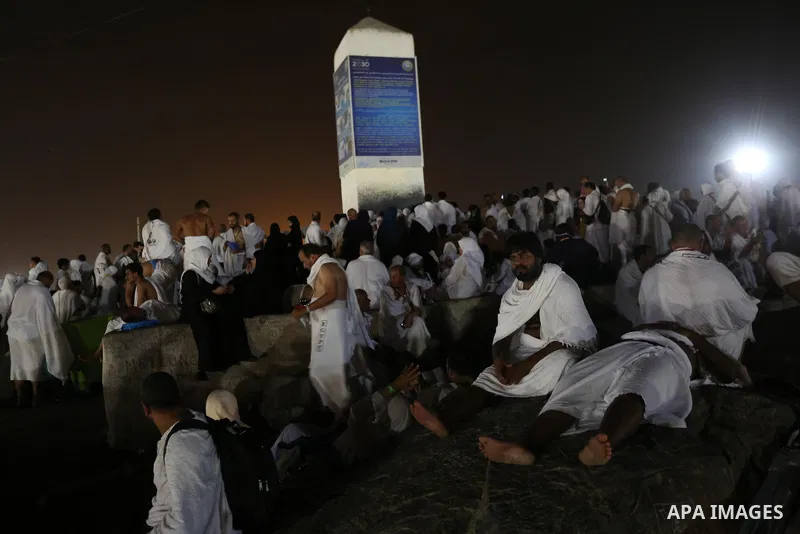 Muslim pilgrims pray on Mount Arafat, as Jabal al-Rahma near Mecca, as they take part in one of the Hajj rituals southeast of the Saudi holy city of Mecca on August 10, 2019. Arafat is the site where Muslims believe the...