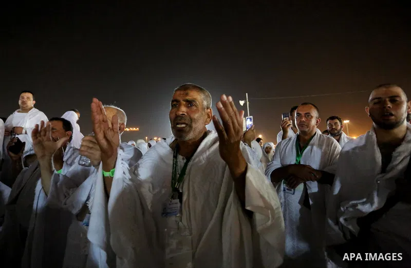 Muslim pilgrims pray on Mount Arafat, as Jabal al-Rahma near Mecca, as they take part in one of the Hajj rituals southeast of the Saudi holy city of Mecca on August 10, 2019. Arafat is the site where Muslims believe the...