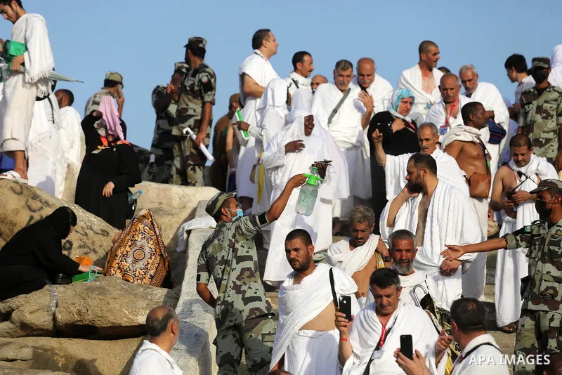 Muslim pilgrims pray on Mount Arafat, as Jabal al-Rahma near Mecca, as they take part in one of the Hajj rituals southeast of the Saudi holy city of Mecca on August 10, 2019. Arafat is the site where Muslims believe the...