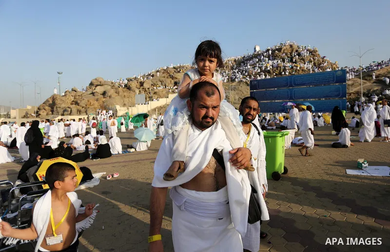Muslim pilgrims pray on Mount Arafat, as Jabal al-Rahma near Mecca, as they take part in one of the Hajj rituals southeast of the Saudi holy city of Mecca on August 10, 2019. Arafat is the site where Muslims believe the...