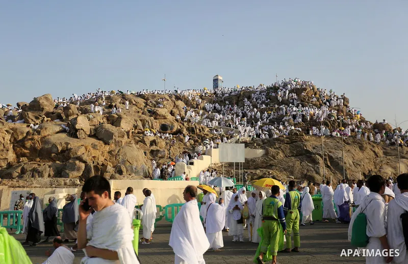 Muslim pilgrims pray on Mount Arafat, as Jabal al-Rahma near Mecca, as they take part in one of the Hajj rituals southeast of the Saudi holy city of Mecca on August 10, 2019. Arafat is the site where Muslims believe the...